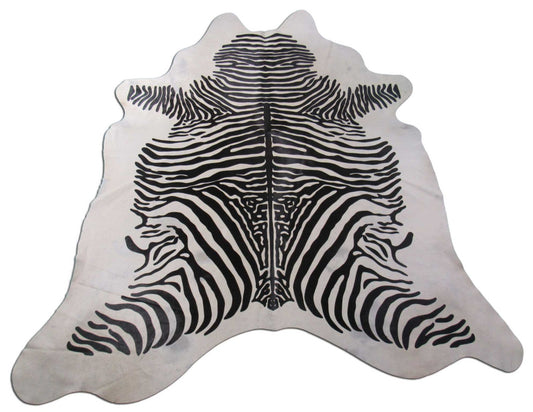 Zebra Cowhide Rug (bald spot and a few imperfections) Size: 7 1/4x6 3/4 feet C-1611