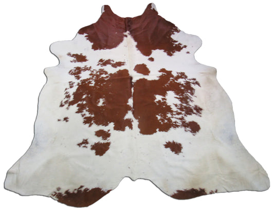 Brown & White Cowhide Rug Size: 8 1/4' X 7' Spotted Brown and White Cowhide Rug O-585