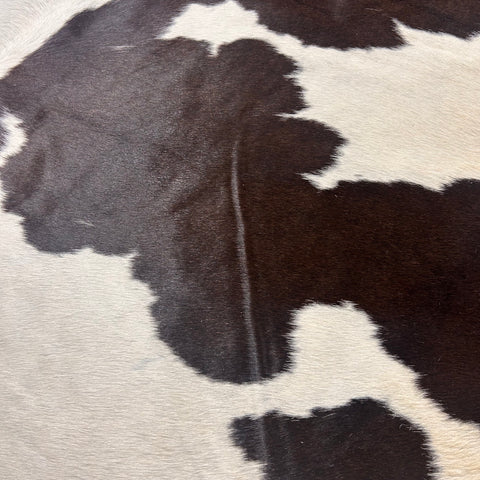 Black & White Spotted Cowhide Rug (black is a bit brownish) Size: 7x6.5 feet D-560