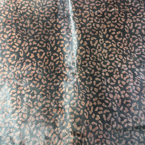 Leopard Print on Black Background Cowhide Rug Size: 7.5x6.5 feet Z-017