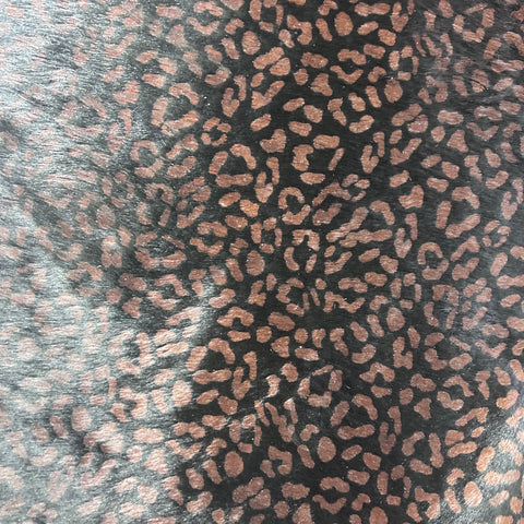 Leopard Print on Black Background Cowhide Rug Size: 7.5x6.5 feet Z-017