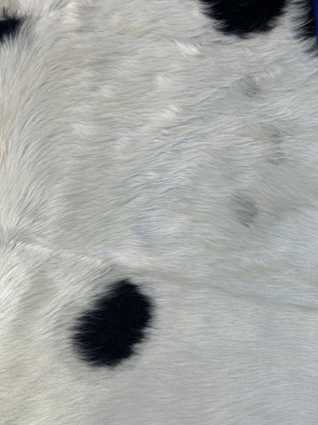 White Cowhide Rug with a few black spots) Size: 8x6.5 feet M-1677