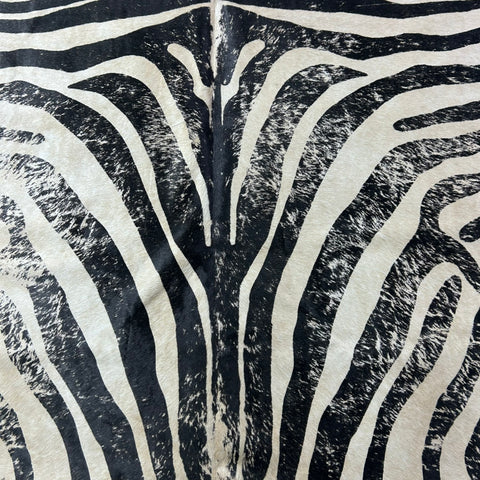 Distressed Zebra Print Cowhide Rug (background is a bit beige) Size: 7.5x6 feet J-029