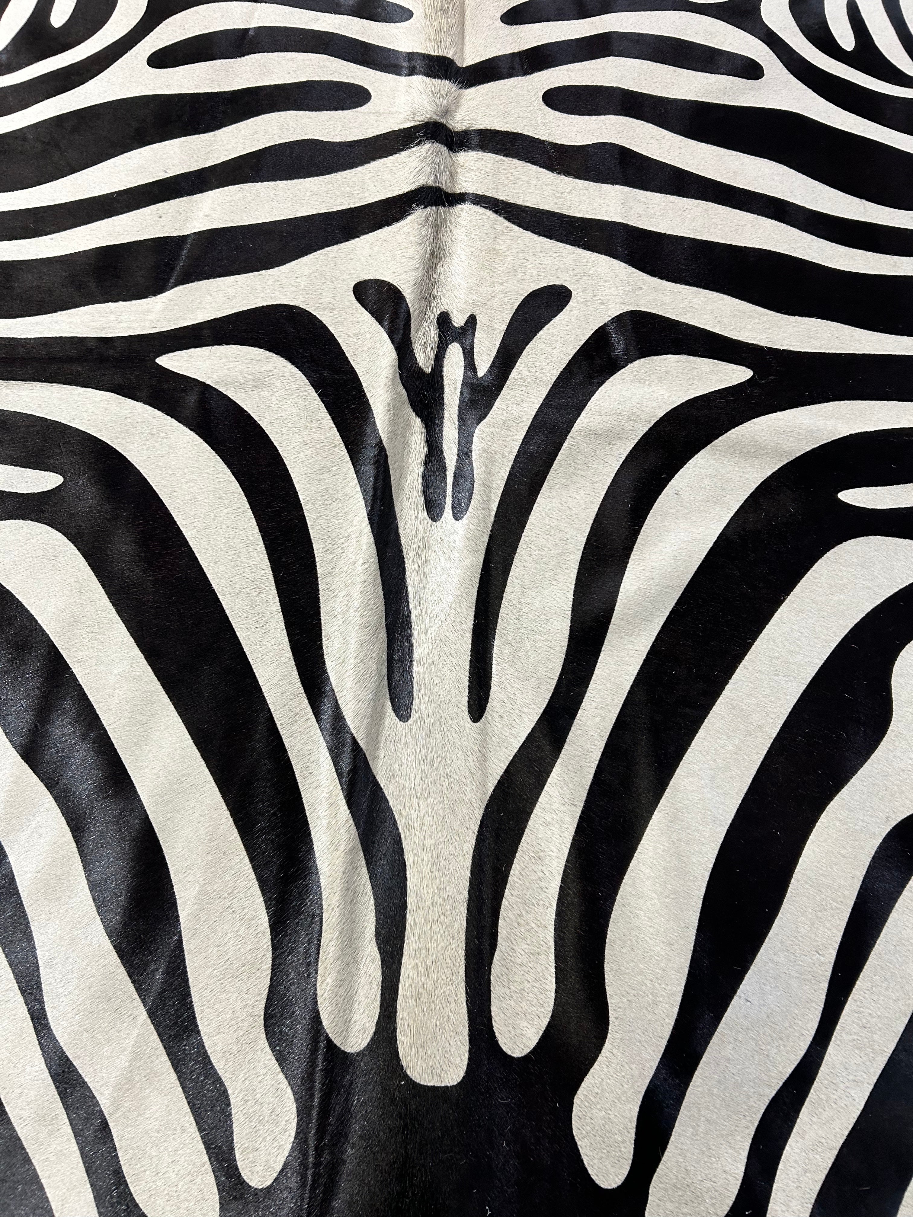 Reverse Zebra Print Cowhide Rug Size: 6.7x5.5 feet D-094