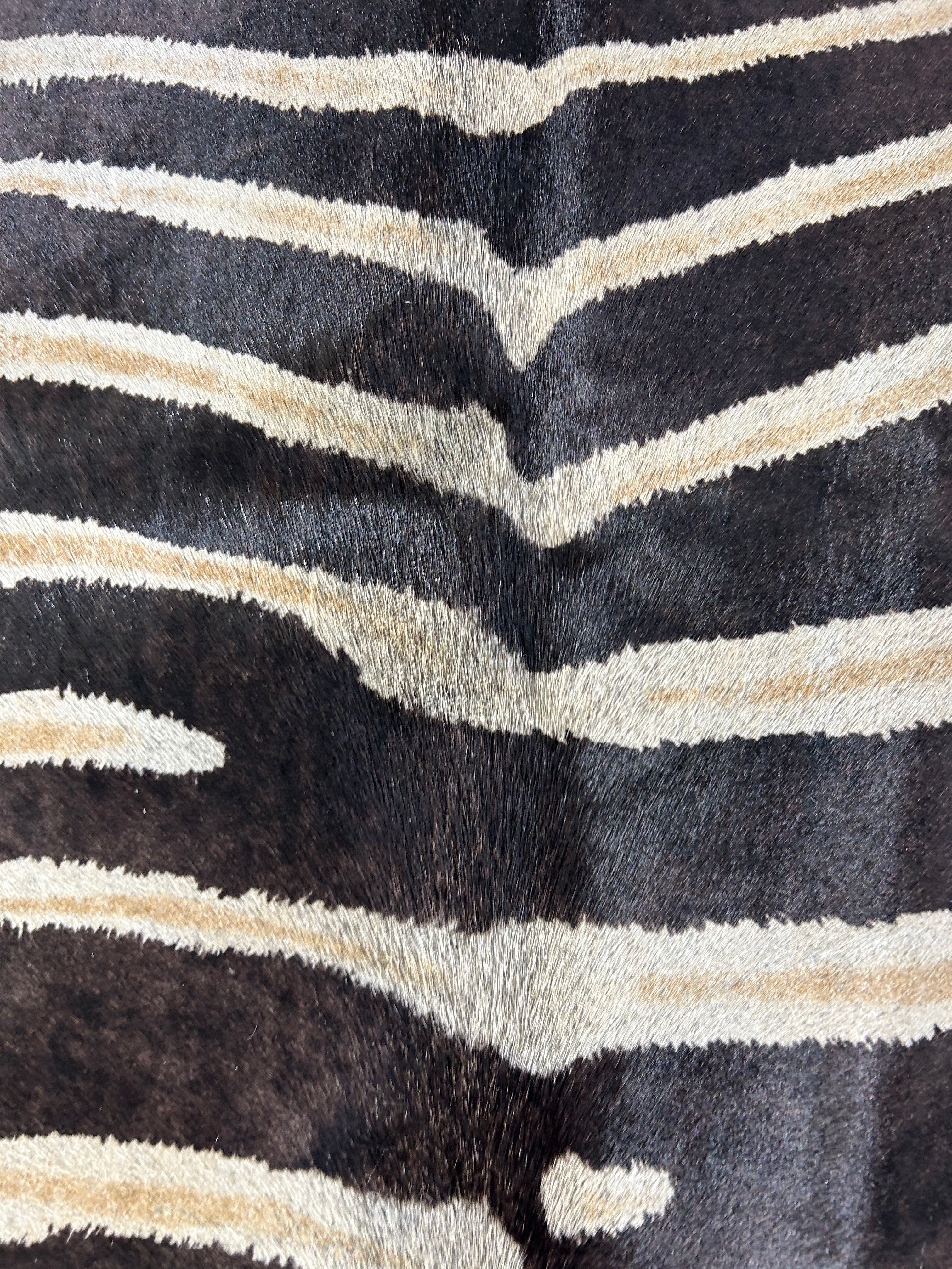 Genuine Zebra Print Cowhide Rug (beige stripes/middle has a bit of grey hair/ 1 scar) Size: 7x5.7 feet D-096