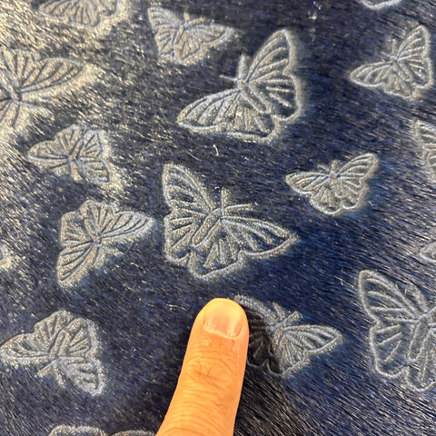 Dyed Dark Blue Cowhide Rug with Laser Butterflies Design Size: 7x7 feet D-608