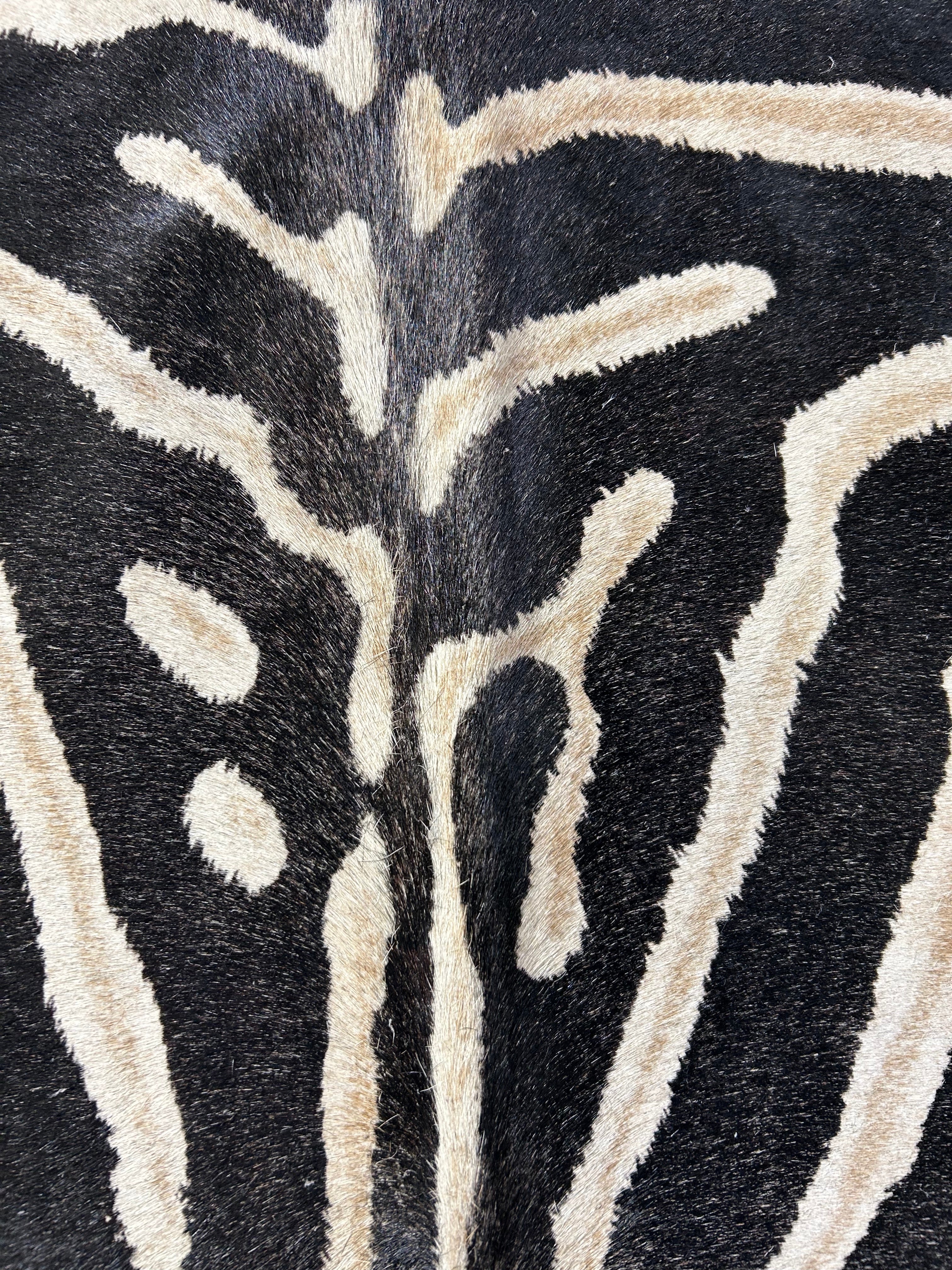 Genuine Zebra Print Cowhide Rug (inner stripes are light brown/black stripes are a bit faded in center of the hide) Size: 7x5.5 feet D-100