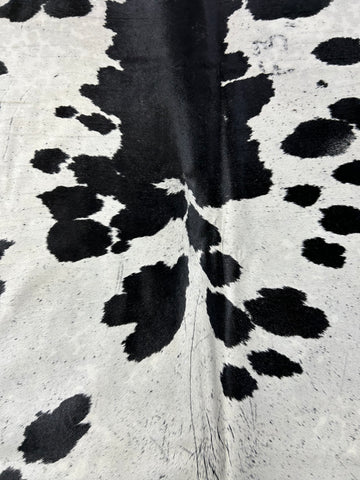 Huge Speckled Cowhide Rug (mainly black and white/ fire brand) Size: 9x7 feet D-195