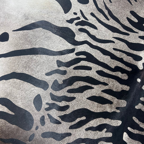 Tiger Print Cowhide Rug on Dark Grey Background Size: 7x6.5 feet Z-078