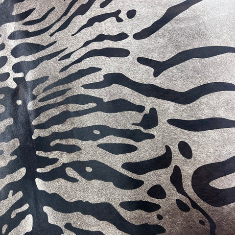 Tiger Print Cowhide Rug on Dark Grey Background Size: 7x6.5 feet Z-078