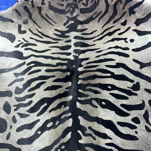 Tiger Print Cowhide Rug on Dark Grey Background Size: 7.2x6 feet Z-079