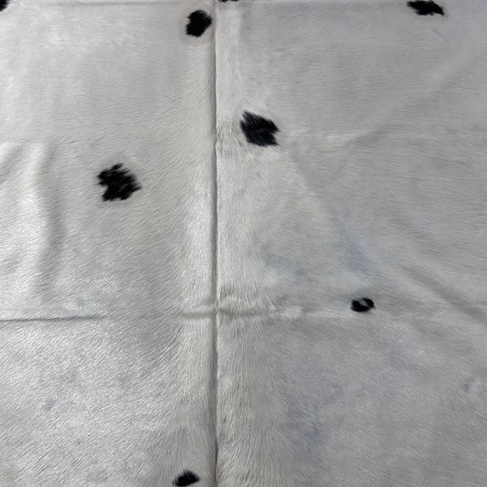 Black and White Cowhide Rug with Very Light White Background D-885