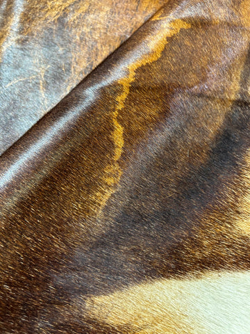 Lion Print Cowhide Rug (hair-on leather) Size: 5.5x5 feet D-415