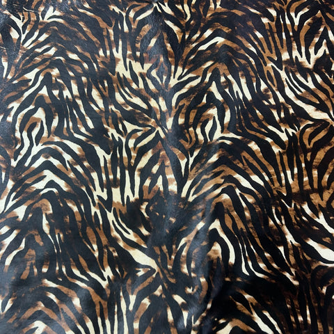 Baby Zebra on tone on tone Cowhide Rug Size: 7x6 feet Y-139