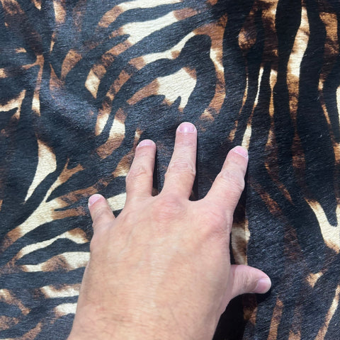 Baby Zebra on tone on tone Cowhide Rug Size: 7x6 feet Y-139