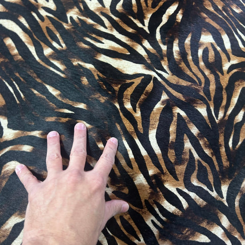 Baby Zebra on tone on tone Cowhide Rug Size: 7x6 feet Y-139