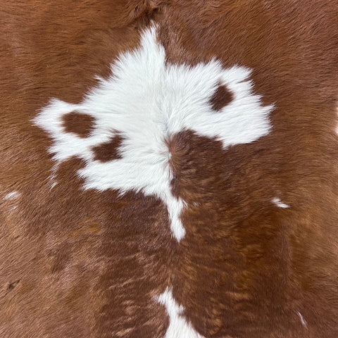Brown and White Calf Skin Size: 40x38" D-991