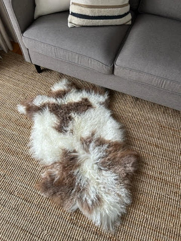 A-2395 Speckled Beige-Brown and White Lamb Skin Average Size: 38X22"
