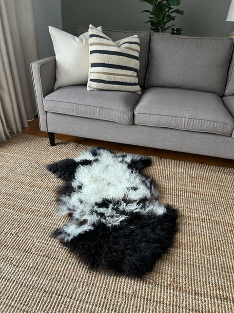 A-2396 Spotted Black and White Lamb Skin Average Size: 38X22 inches