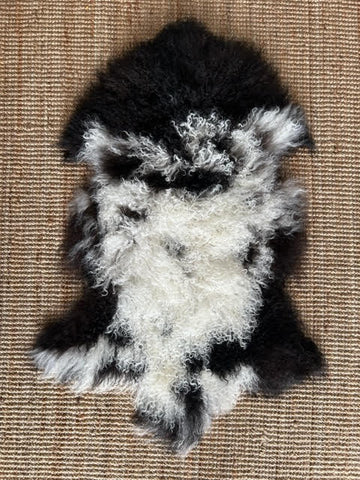A-2396 Spotted Black and White Lamb Skin Average Size: 38X22 inches