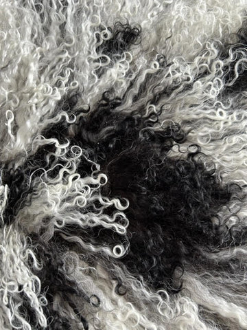 A-2398 Speckled Black and White Lamb Skin Average Size: 38X22 inch
