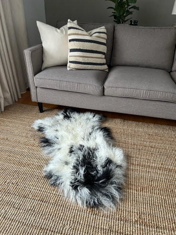 A-2400 Speckled Black and White Lamb Skin Average Size: 38X22 inches