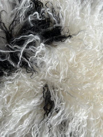 A-2400 Speckled Black and White Lamb Skin Average Size: 38X22 inches
