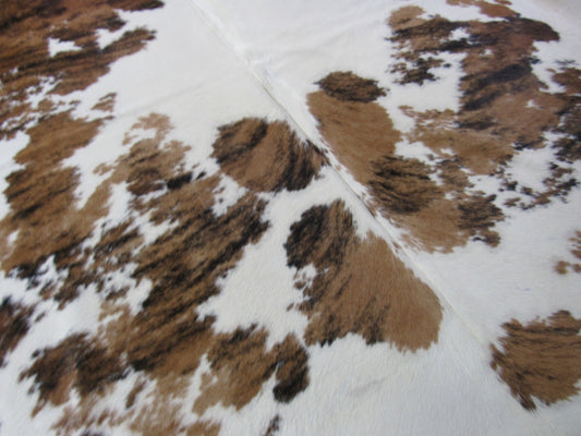 Speckled Tricolor Cowhide Rug Size: 8' X 6 1/2' Speckled Brown and White Cowhide Rug B-064