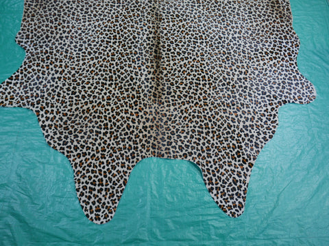 Leopard Print Cowhide Rug Size: 7 1/4' X 5 1/2' Leopard Cowhide Rug C-127