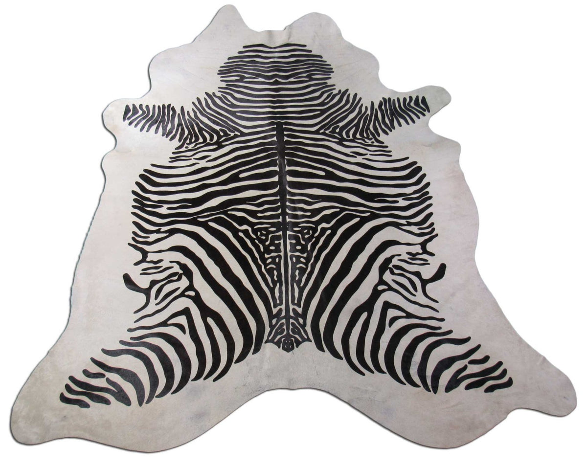 Zebra Print Cowhide Rug (light background but a few specs) Size: 7 1/4x6 3/4 feet C-1584