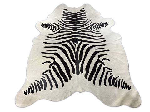 Zebra Print Cowhide Rug (fire brands/ light background/ parts are slightly greyish in the middle/ nicks) Size: 7x6 feet C-1861