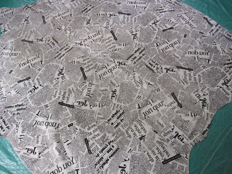 Newspaper Print Cowhide Rug (Background is Light Beige) Size: 6.25x6 feet C-1335