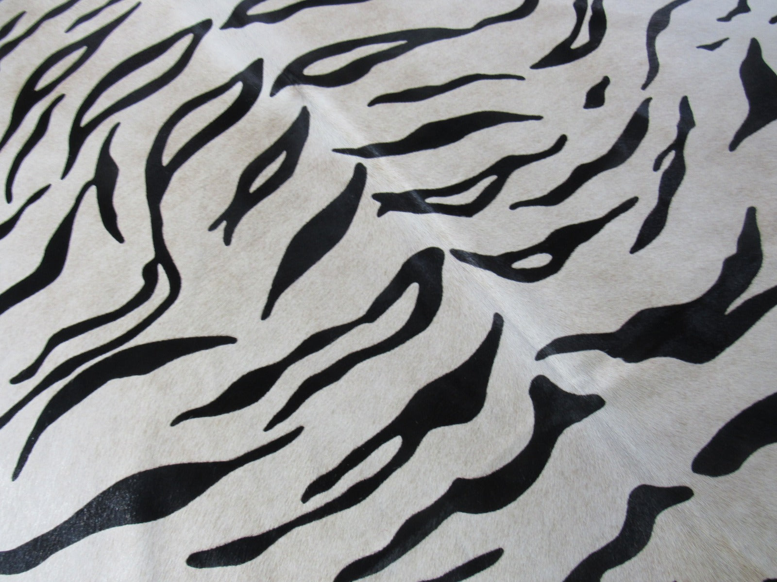 Tiger Print Cowhide Rug on Light Beige Background (fire brand) Size: 6.7x6.7 feet C-1684