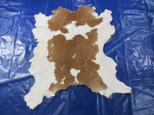 Brown & White Calf Skin Size: 41x38" O-1146