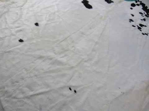 HUGE Black & White Cowhide Rug (Most black spots are in the neck area) Size: 9x7.5 feet B-217