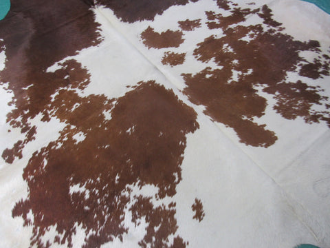 Gorgeous Brown & White Cowhide Rug (2 fire brands) Size: 7 3/4x6 1/2 feet B-239