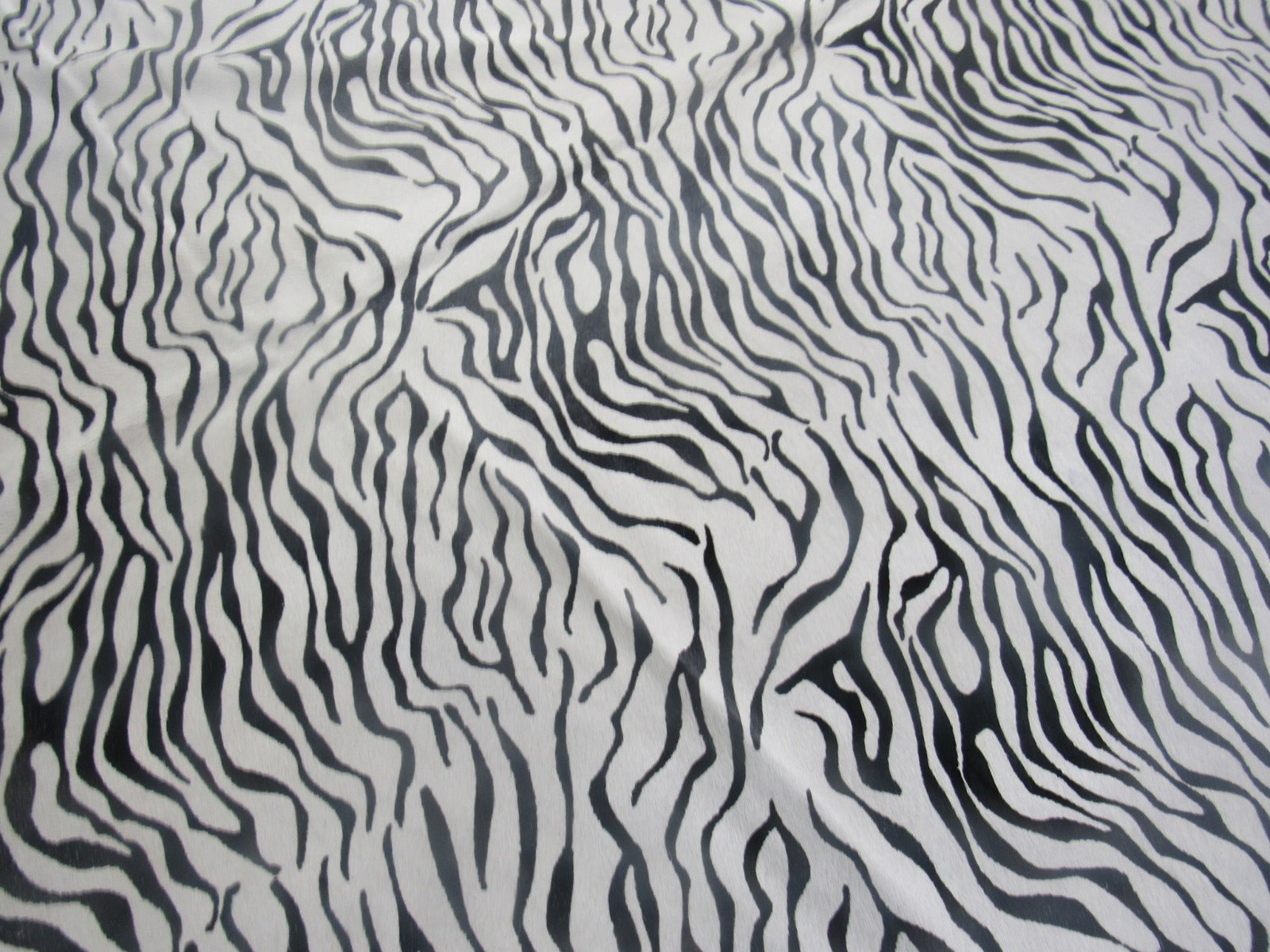 Baby Zebra Print Cowhide Rug Size: 7 1/2' X 6' Black/White Zebra Cowhide Rug C-1523
