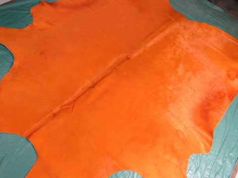 Dyed Orange Cowhide Rug - Size: 7.5' x 7' O-1018