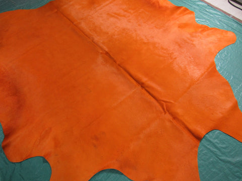 Dyed Orange Cowhide Rug - Size: 7.5' x 7' O-1018