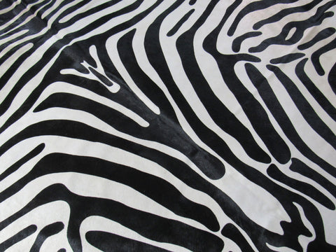 Upholstery Zebra Cowhide Rug (beautiful but neck area and edge of hind legs is a bit darker) Size: 7 1/4x6 1/4 feet C-1575