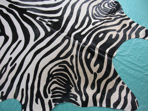 Upholstery Zebra Cowhide Rug (beautiful but neck area and edge of hind legs is a bit darker) Size: 7 1/4x6 1/4 feet C-1575