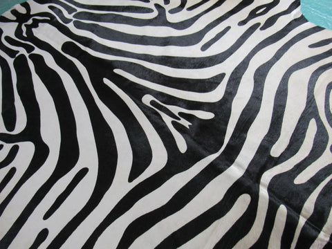 Upholstery Zebra Cowhide Rug (beautiful but neck area and edge of hind legs is a bit darker) Size: 7 1/4x6 1/4 feet C-1575