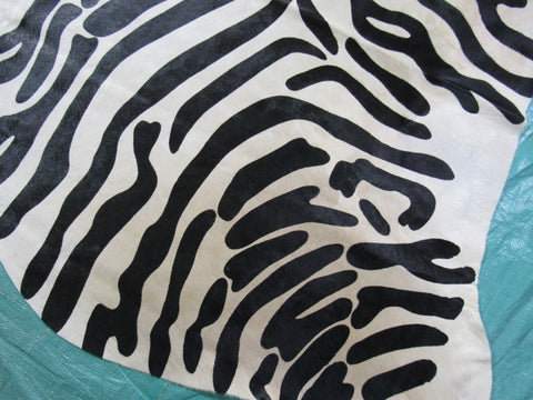 Upholstery Zebra Cowhide Rug (beautiful but neck area and edge of hind legs is a bit darker) Size: 7 1/4x6 1/4 feet C-1575