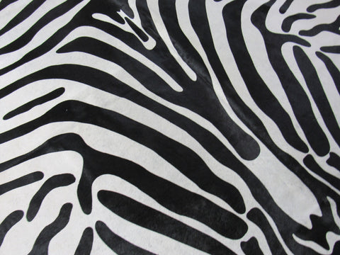 Upholstery Zebra Cowhide Rug (beautiful but has a stitch, neck is a bit darker and very short hair) Size: 7x6 feet C-1577