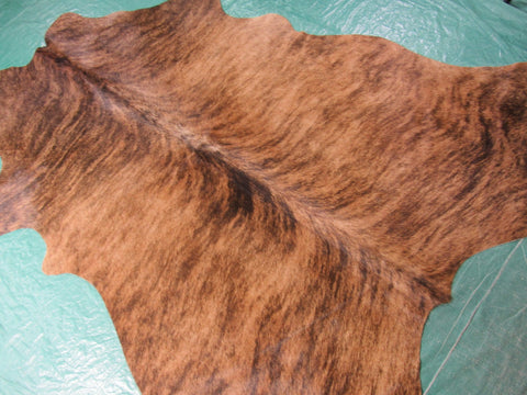 Medium Brindle Cowhide Rug (quite narrow) Size: 6 3/4x5 3/4 feet M-1081