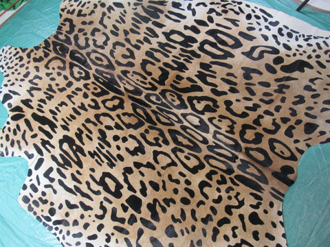 Jaguar Print Cowhide Rug (light background/ one blurry spot) Size: 7 1/4x6 3/4 feet C-1604