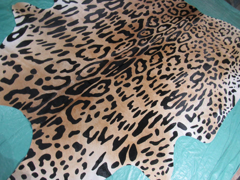 Jaguar Print Cowhide Rug (light background/ one blurry spot) Size: 7 1/4x6 3/4 feet C-1604