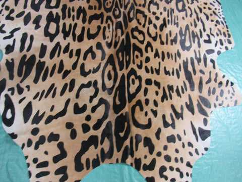 Jaguar Print Cowhide Rug (light background/ one blurry spot) Size: 7 1/4x6 3/4 feet C-1604