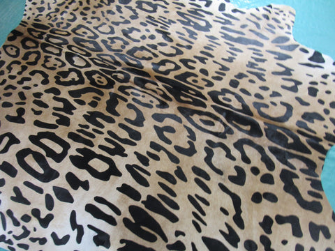 Jaguar Print Cowhide Rug (light background/ one blurry spot) Size: 7 1/4x6 3/4 feet C-1604