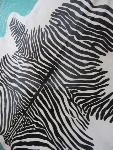 Zebra Cowhide Rug (bald spot and a few imperfections) Size: 7 1/4x6 3/4 feet C-1611
